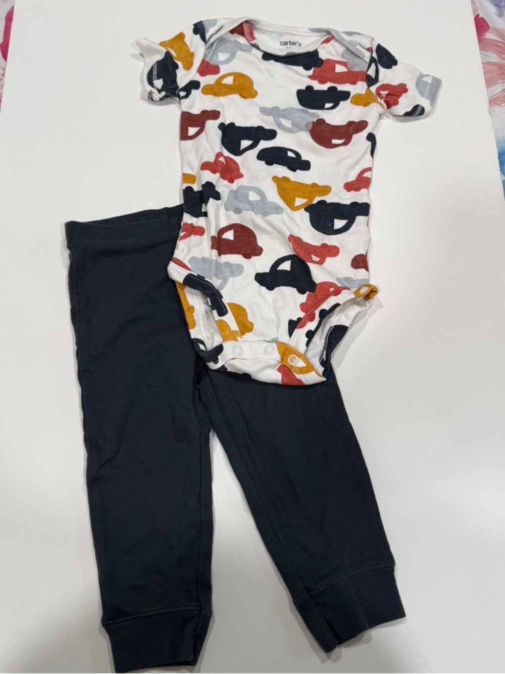Carter’s two-piece short sleeve shirt and pants cars size 9 to 12 months